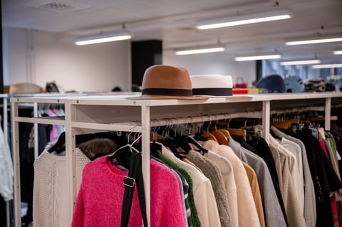 Clothing rack with sweaters and jackets