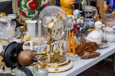 Golden mantel clock and vintage items